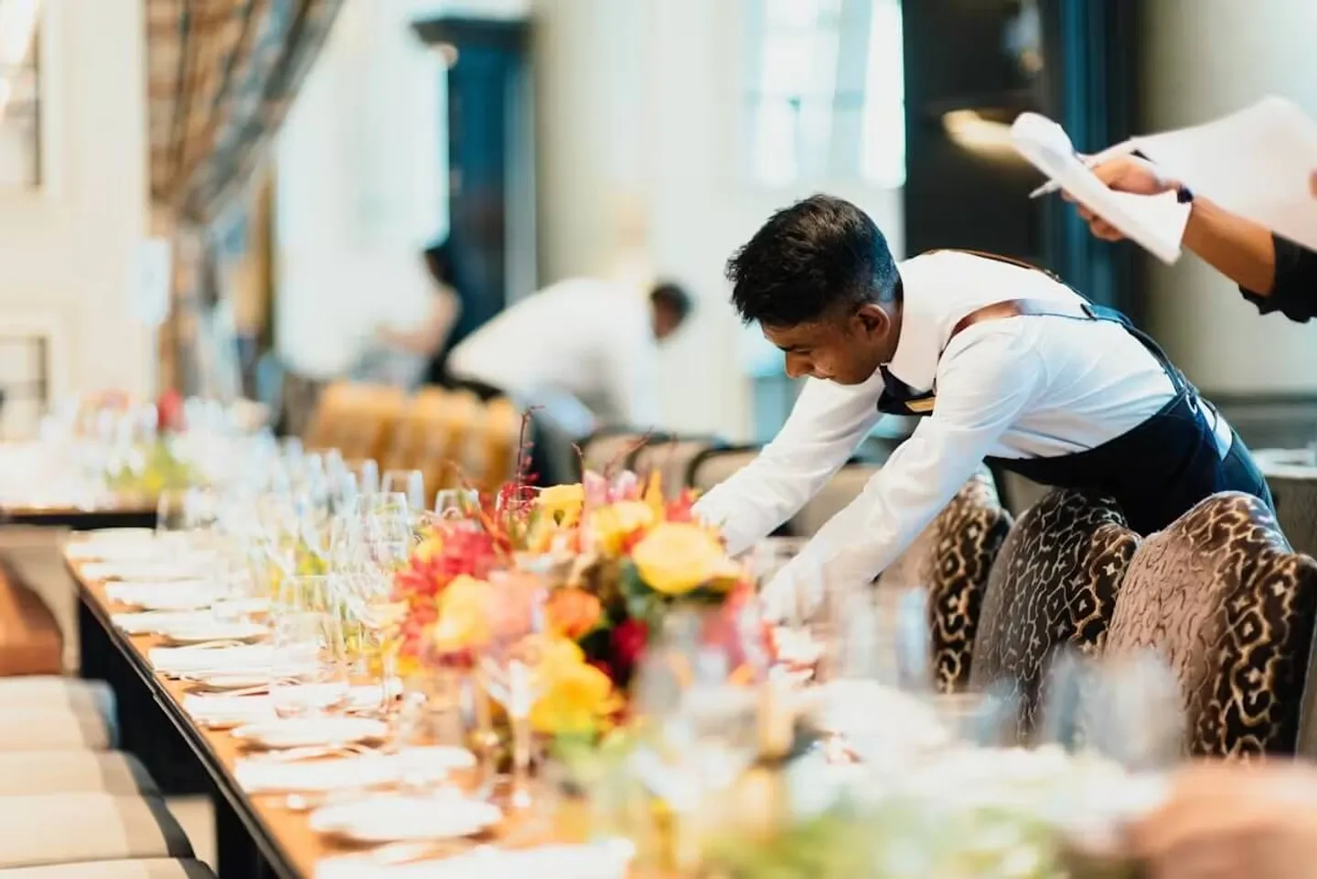 Man setting a table