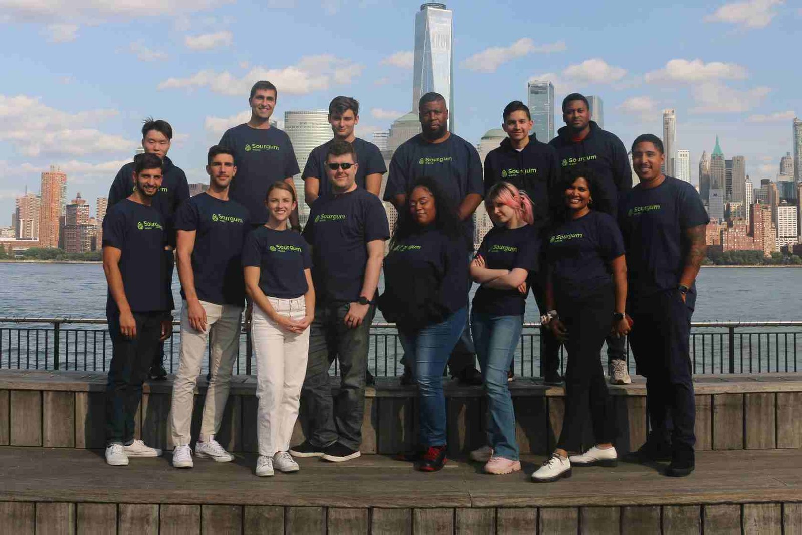 The Sourgum Waste team in front of the NYC skyline