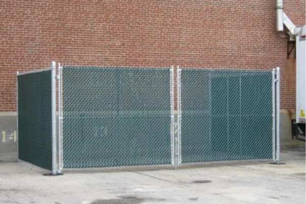 chain link and slates dumpster enclosure