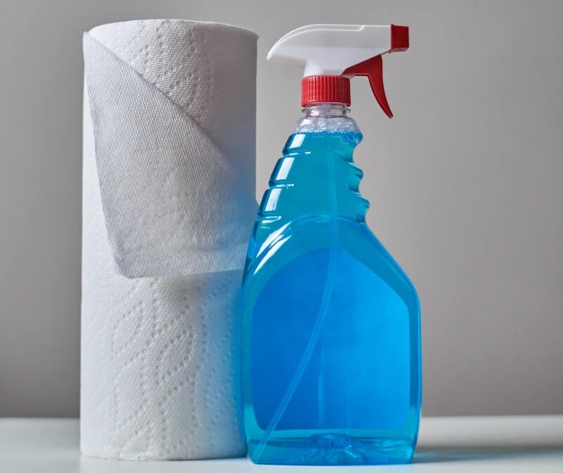 Disposing of a window cleaner bottle and paper towels