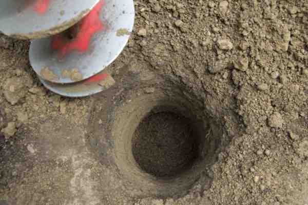 digging post holes for trash enclosure