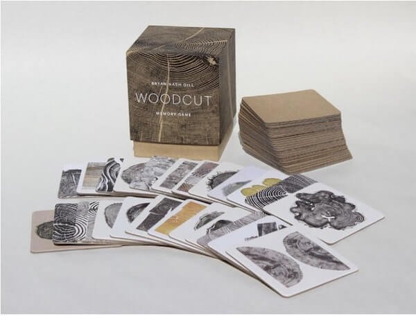 Memory card game featuring tree cutting images