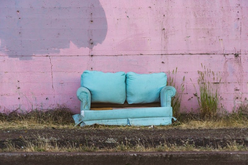 A blue couch that can be recycled