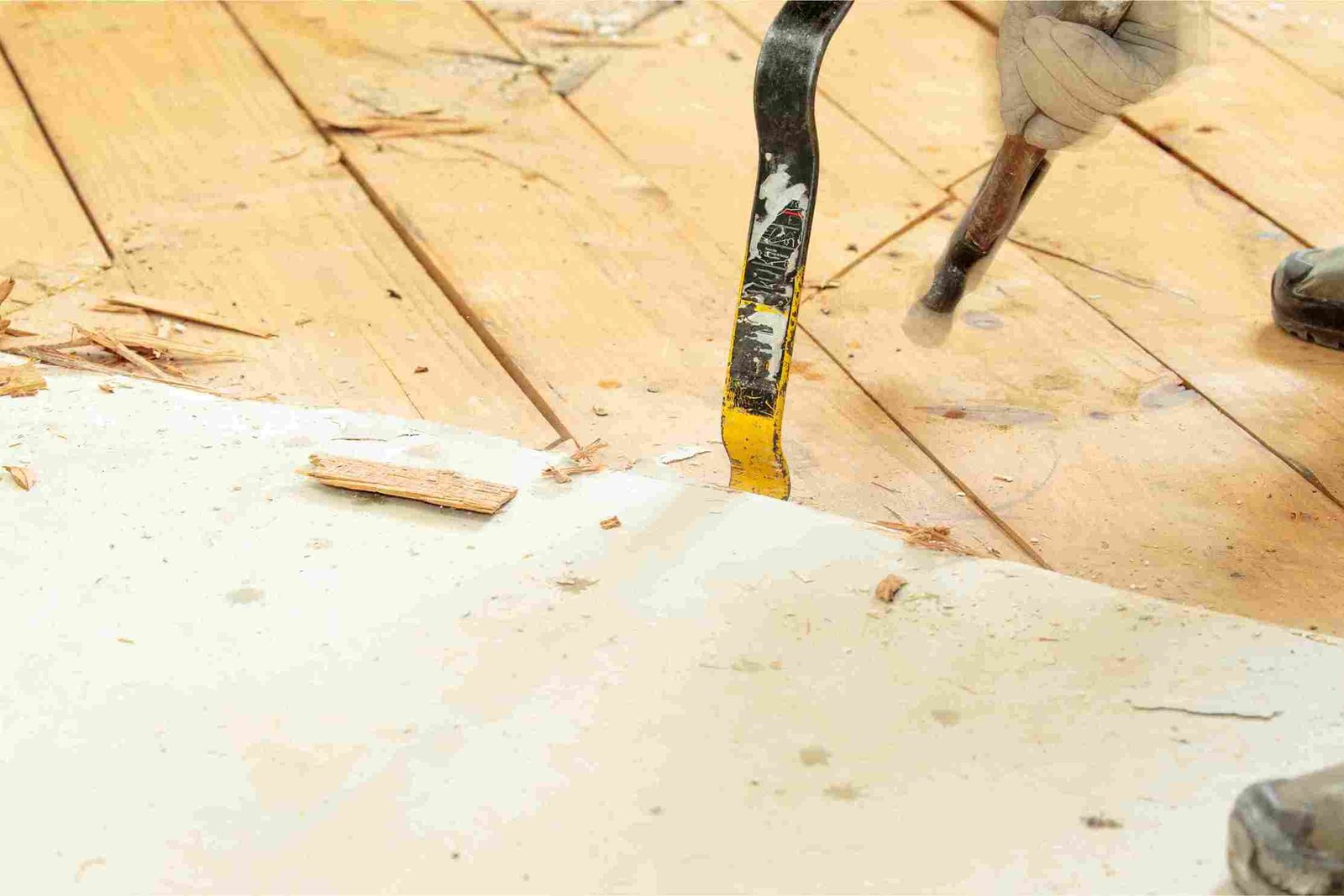 inspecting the subflooring after tile removal