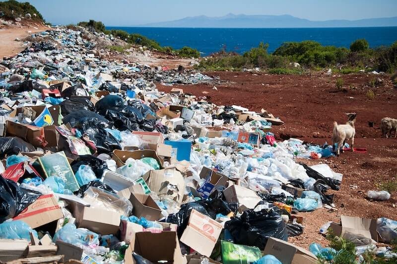 Trash decomposing on the side of a cliff